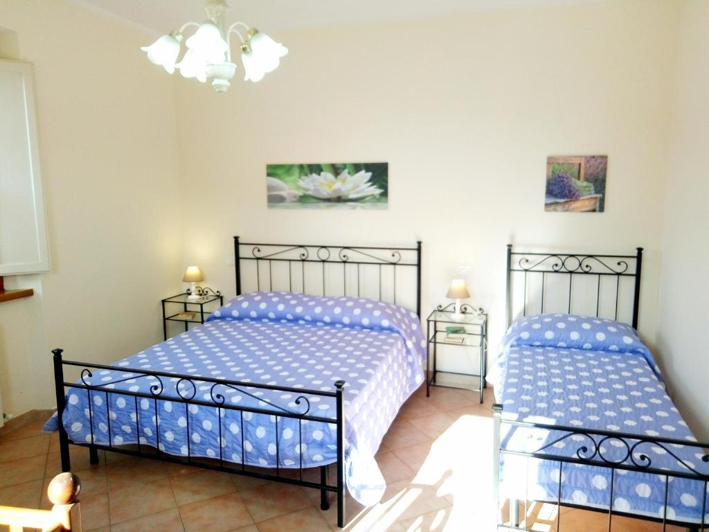 A bed or beds in a room at Villa Margherita - Comfort house