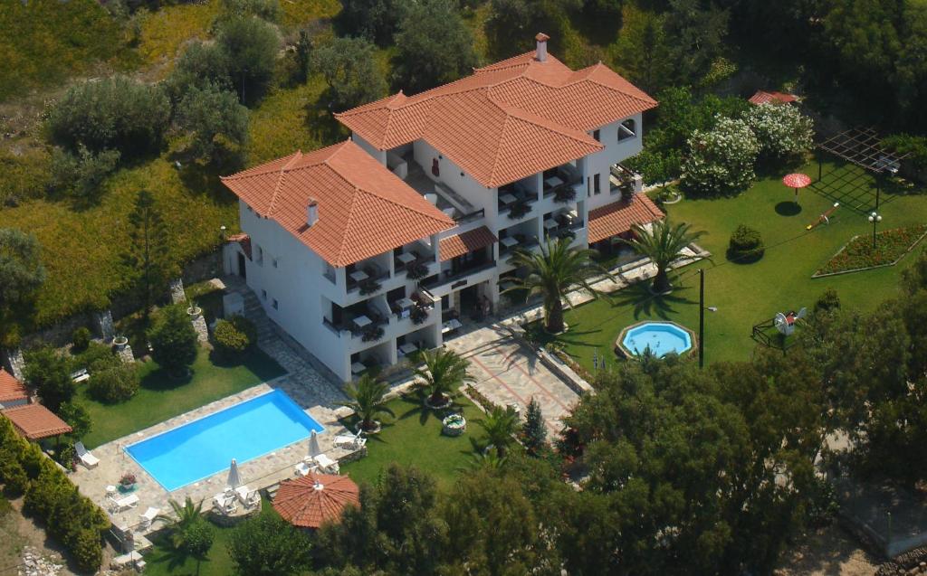 an aerial view of a house with a swimming pool at Villa Spartias in Skiathos