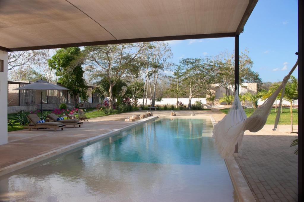 Bazén v ubytování Hotel Casa de Campo Conkal Merida nebo v jeho okolí