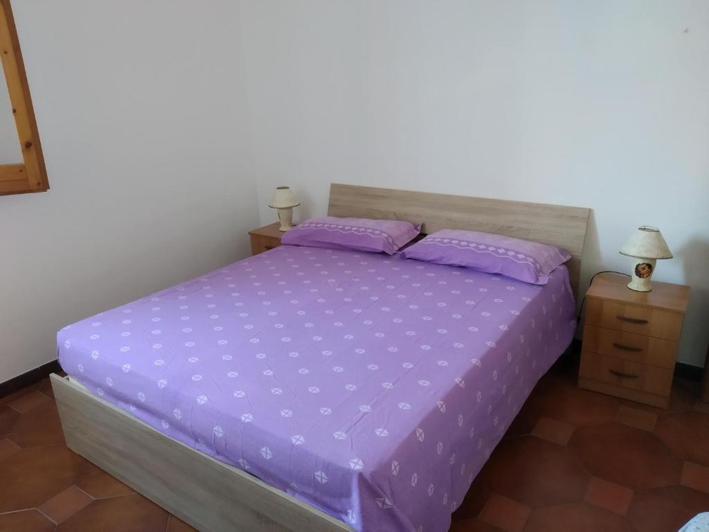 Postel nebo postele na pokoji v ubytování mare profumo di mare