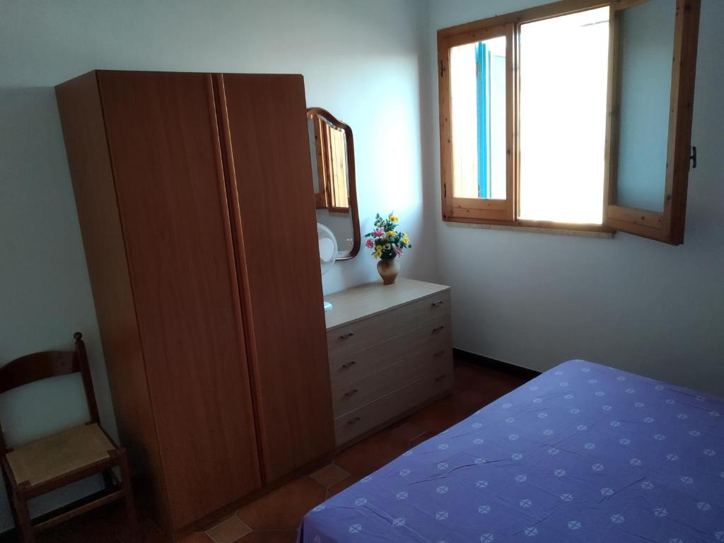 Postel nebo postele na pokoji v ubytování mare profumo di mare