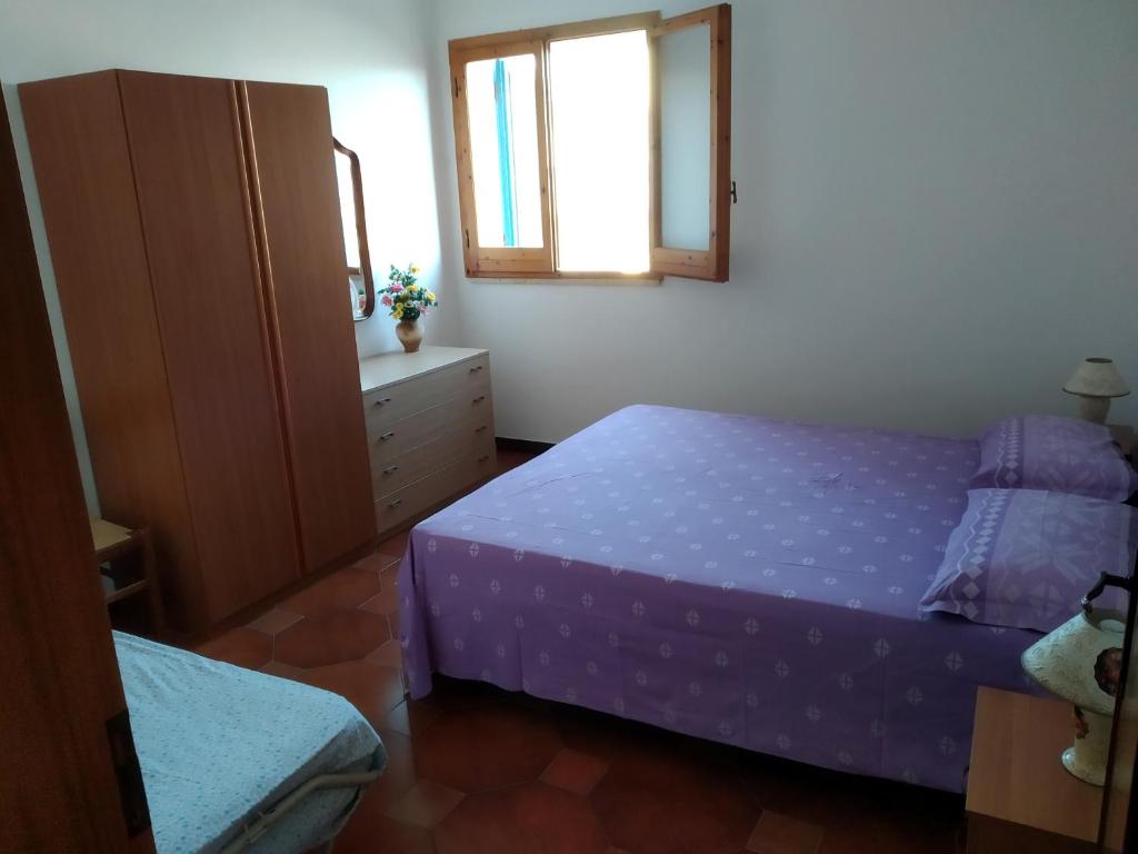 Postel nebo postele na pokoji v ubytování mare profumo di mare