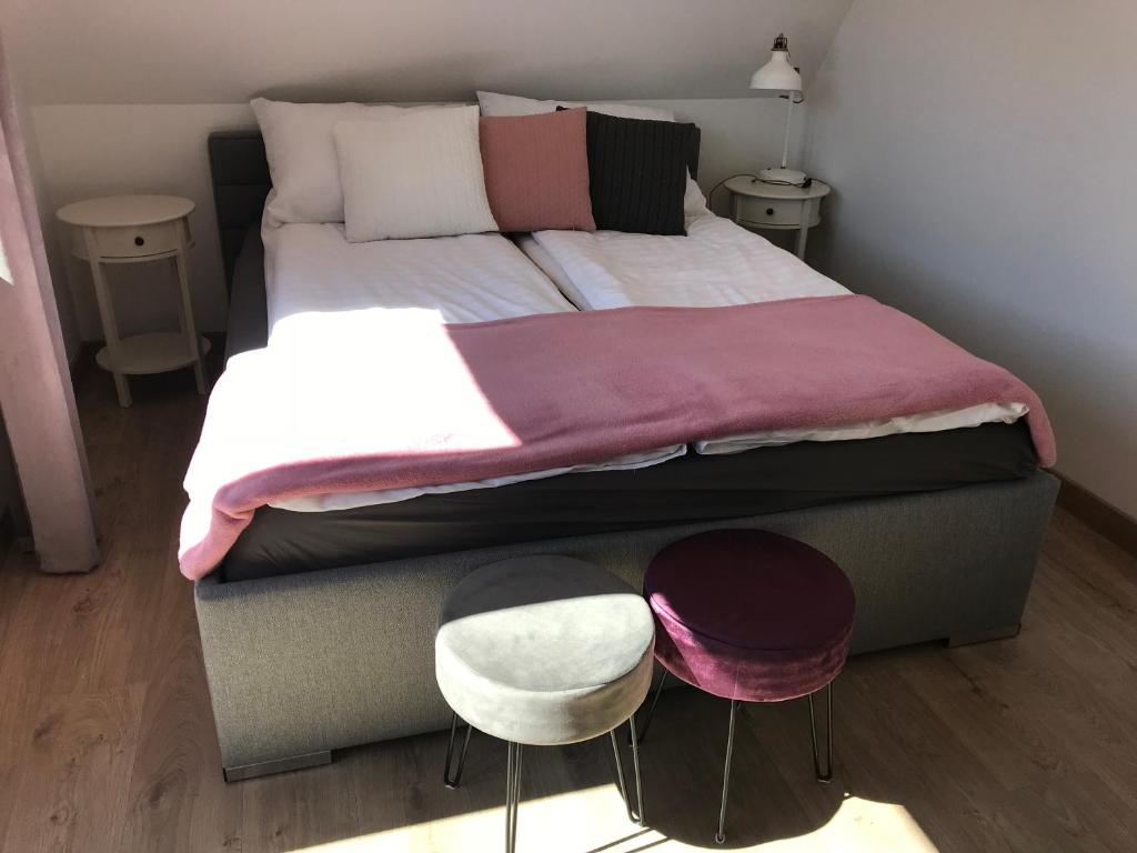 Posteľ alebo postele v izbe v ubytovaní ARKA HOUSE DOMEK WIDOKOWY