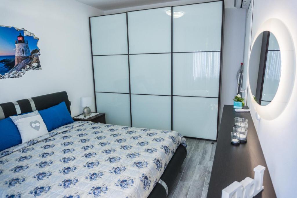Posteľ alebo postele v izbe v ubytovaní Appartamento Oasi Felice