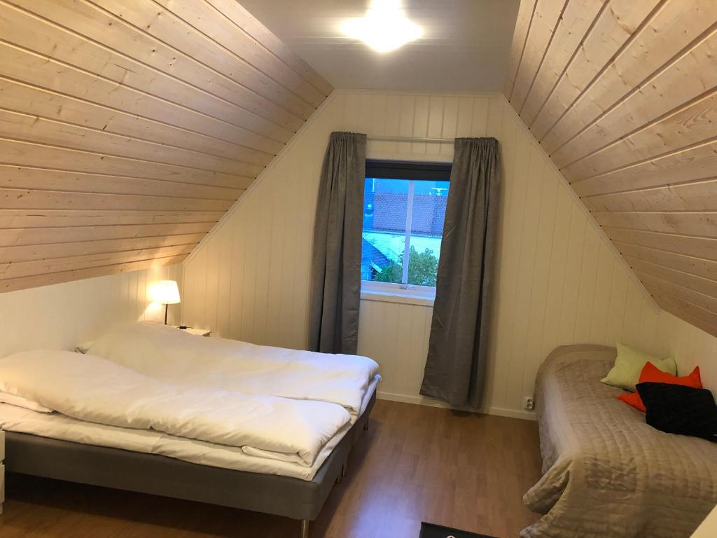 Postel nebo postele na pokoji v ubytování Balestrand Fjordapartments