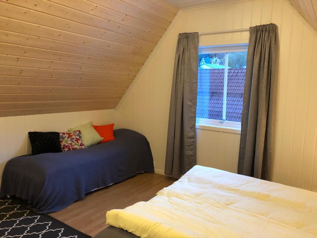 Postel nebo postele na pokoji v ubytování Balestrand Fjordapartments