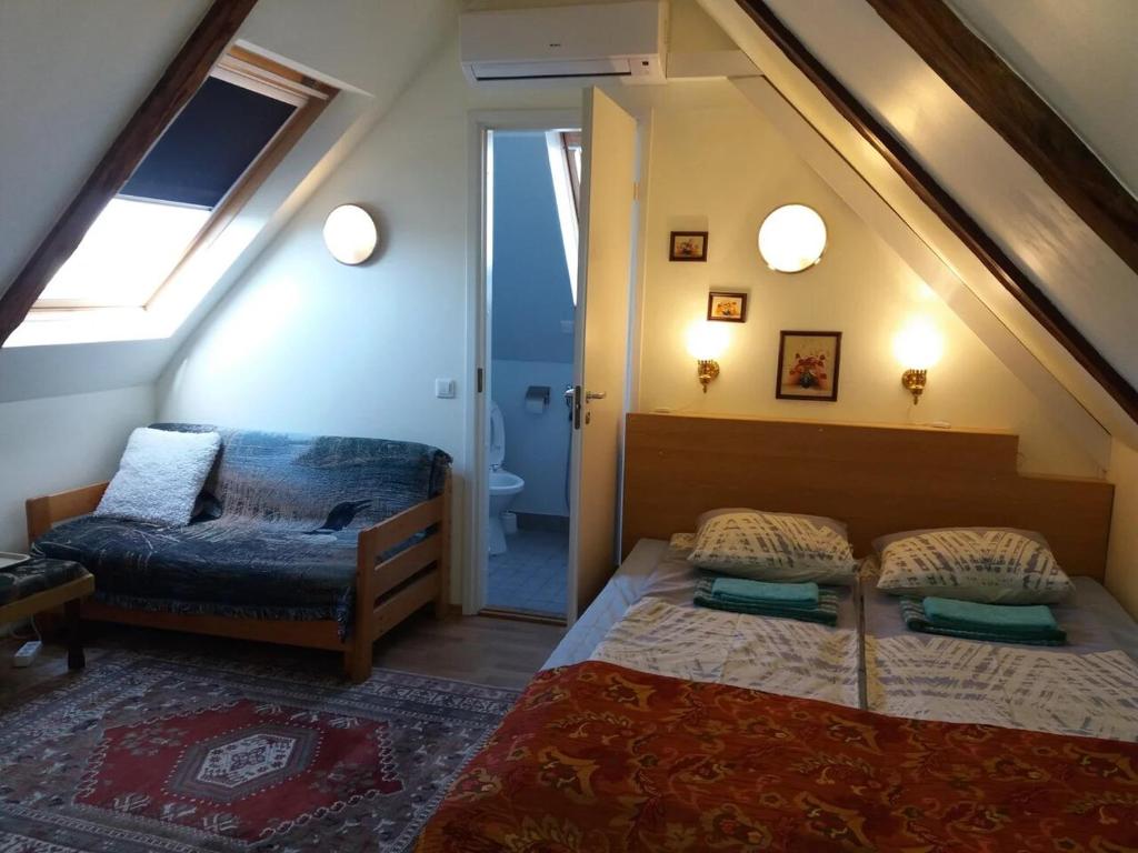 Postel nebo postele na pokoji v ubytování Sunrise majutus