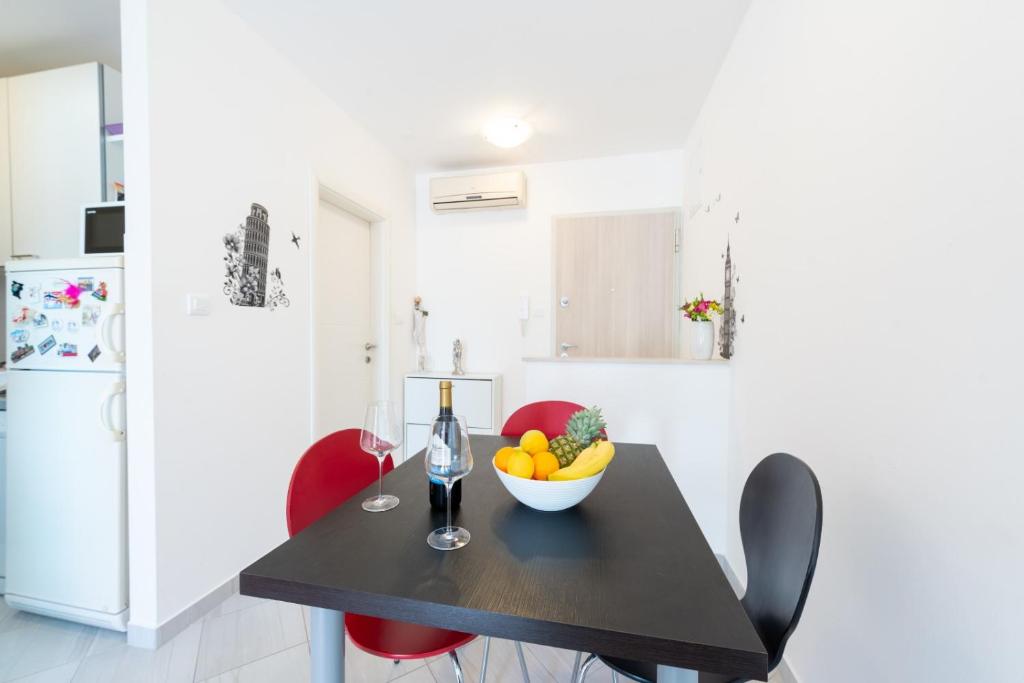 Kuchyň nebo kuchyňský kout v ubytování Apartman LL