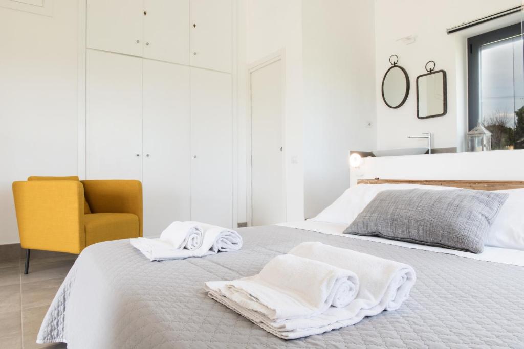 Postel nebo postele na pokoji v ubytování AGRITURISMO LA GHIGA