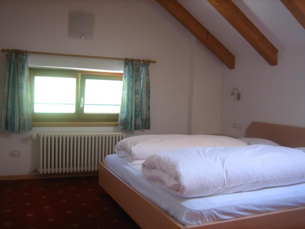 Postel nebo postele na pokoji v ubytování Garni - Appartement Neumairhof