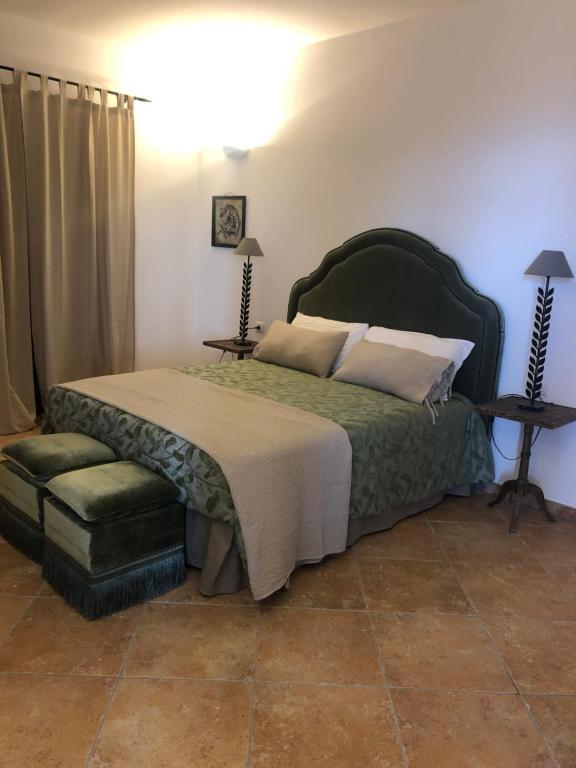 Postel nebo postele na pokoji v ubytování Dimora Le Ginestre Adults Only