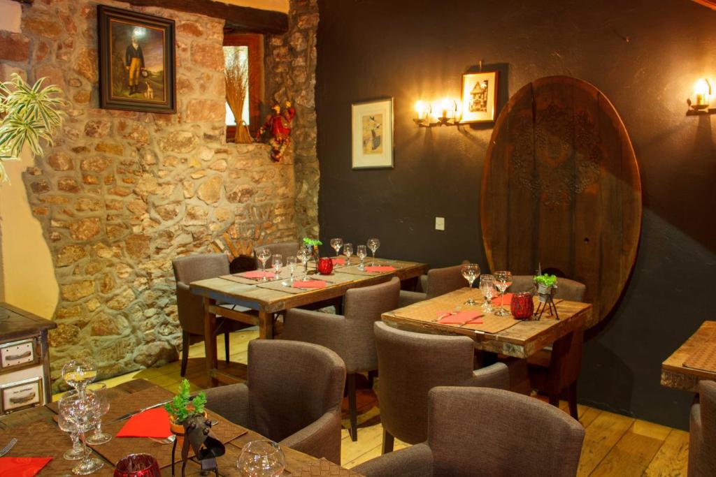 Posezení v ubytování Hotel Au Cerf