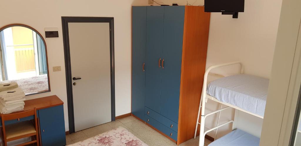 Postel nebo postele na pokoji v ubytování B&B Villa Rocchi