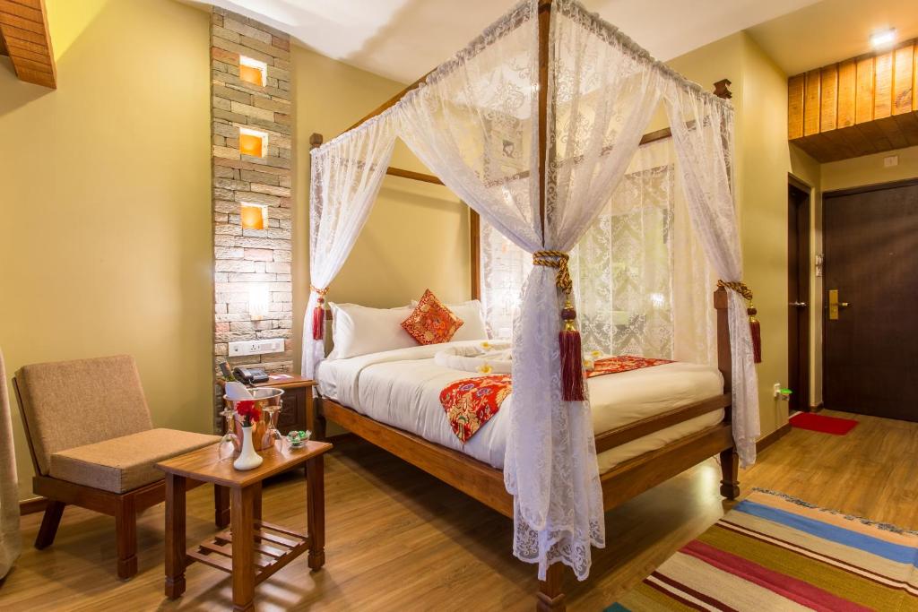 Postel nebo postele na pokoji v ubytování Hotel Mala Pokhara