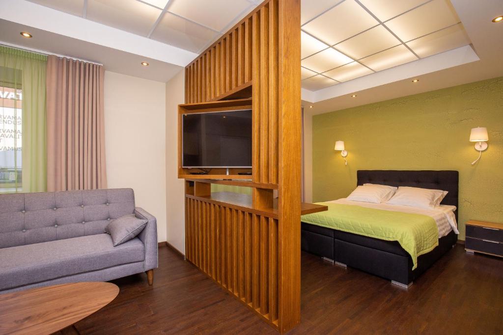 TV a/nebo společenská místnost v ubytování P54 Apartment