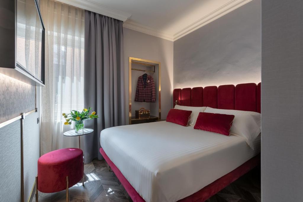 Łóżko lub łóżka w pokoju w obiekcie Hotel Milano & SPA***S