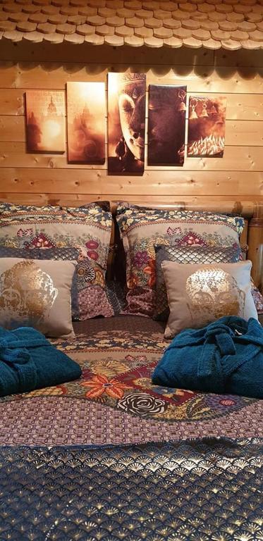 Postel nebo postele na pokoji v ubytování Aux murmures de la nature B&B