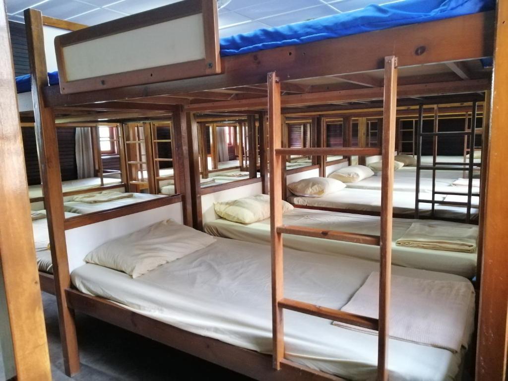 Postel nebo postele na pokoji v ubytování AsiaCamp Taman Negara Resort