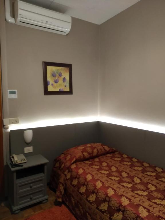 Posteľ alebo postele v izbe v ubytovaní Albergo Ristorante Monterosa