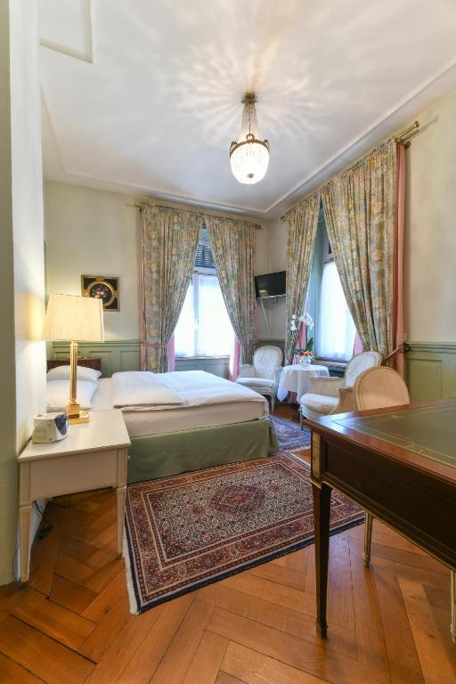 Postel nebo postele na pokoji v ubytování Hotel Park Villa