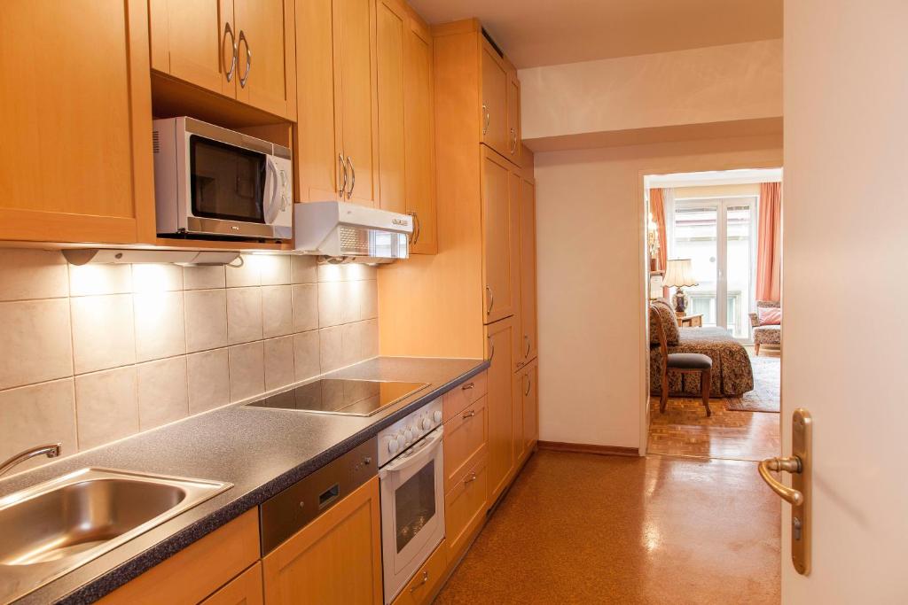 Kuchyň nebo kuchyňský kout v ubytování Pension Sacher - Apartments am Stephansplatz
