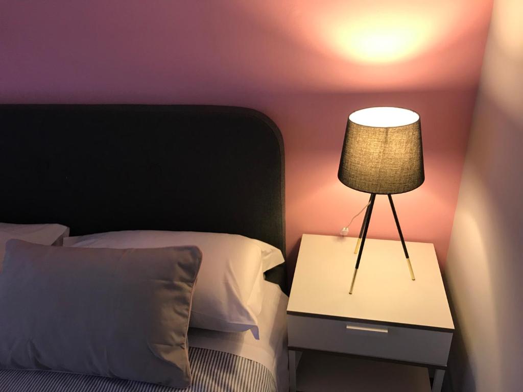 Postel nebo postele na pokoji v ubytování Casapiu Rooms