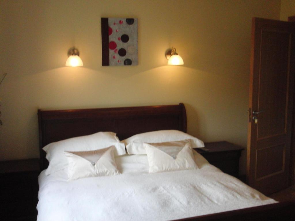 Postel nebo postele na pokoji v ubytování Woodlands House