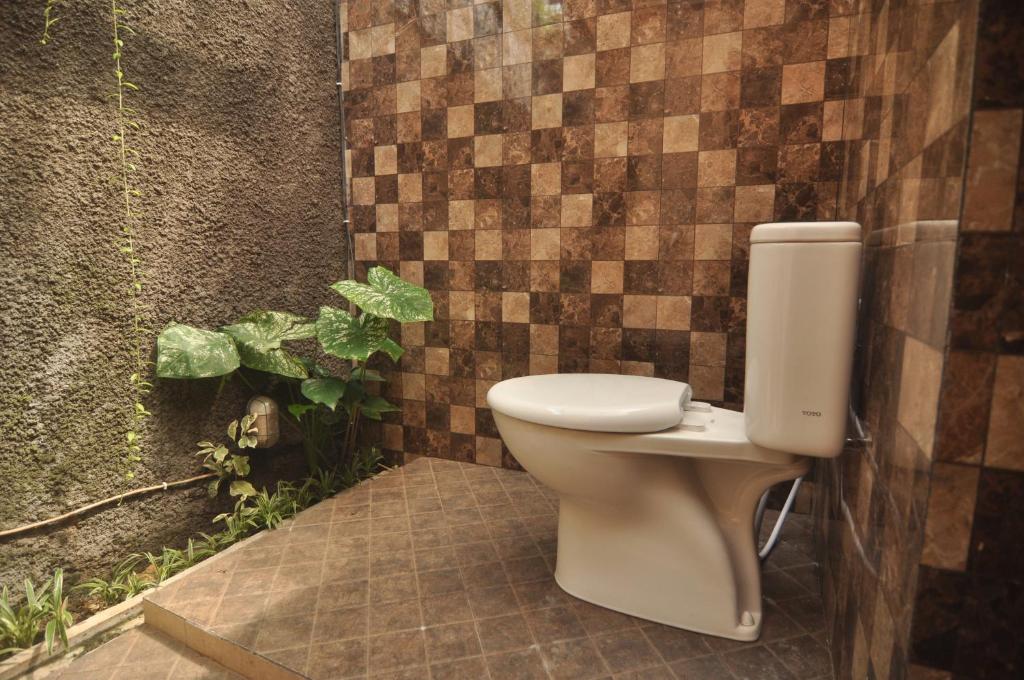 Koupelna v ubytování Dedeane ubud