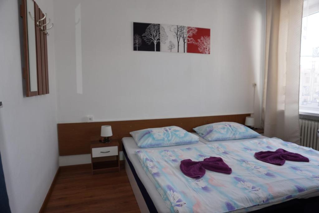 Postel nebo postele na pokoji v ubytování Hotel Guľa