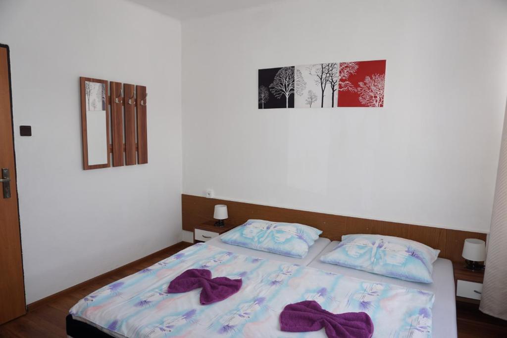 Postel nebo postele na pokoji v ubytování Hotel Guľa