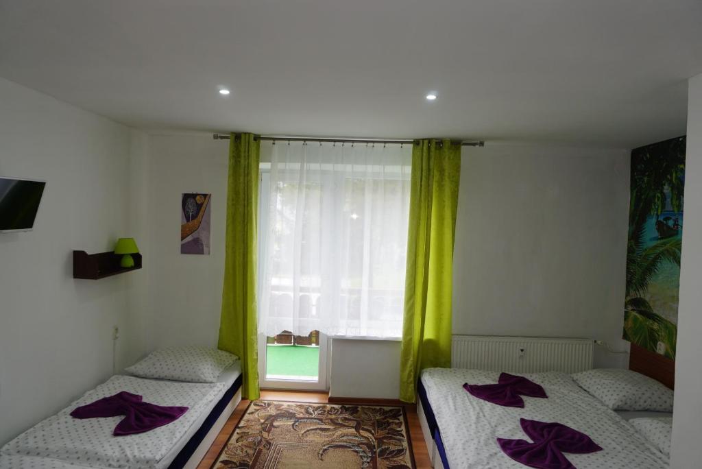 Postel nebo postele na pokoji v ubytování Hotel Guľa