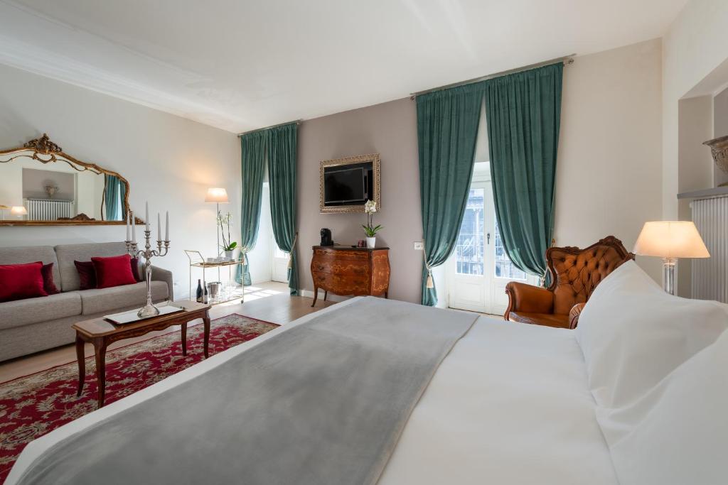 Postel nebo postele na pokoji v ubytování Corte Realdi Luxury Rooms Torino