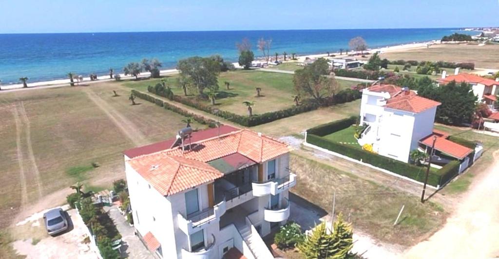an aerial view of a house next to the ocean at Oxana house in Nea Moudania