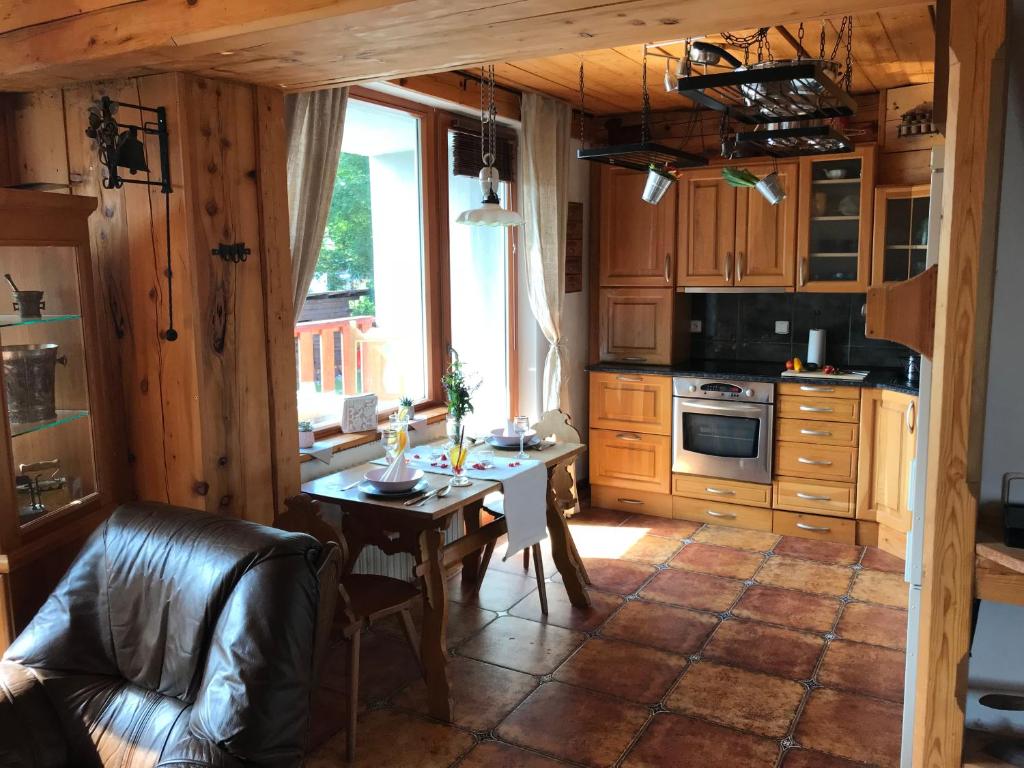 Kuchyň nebo kuchyňský kout v ubytování Rustikální Apartmán v srdci Šumavy