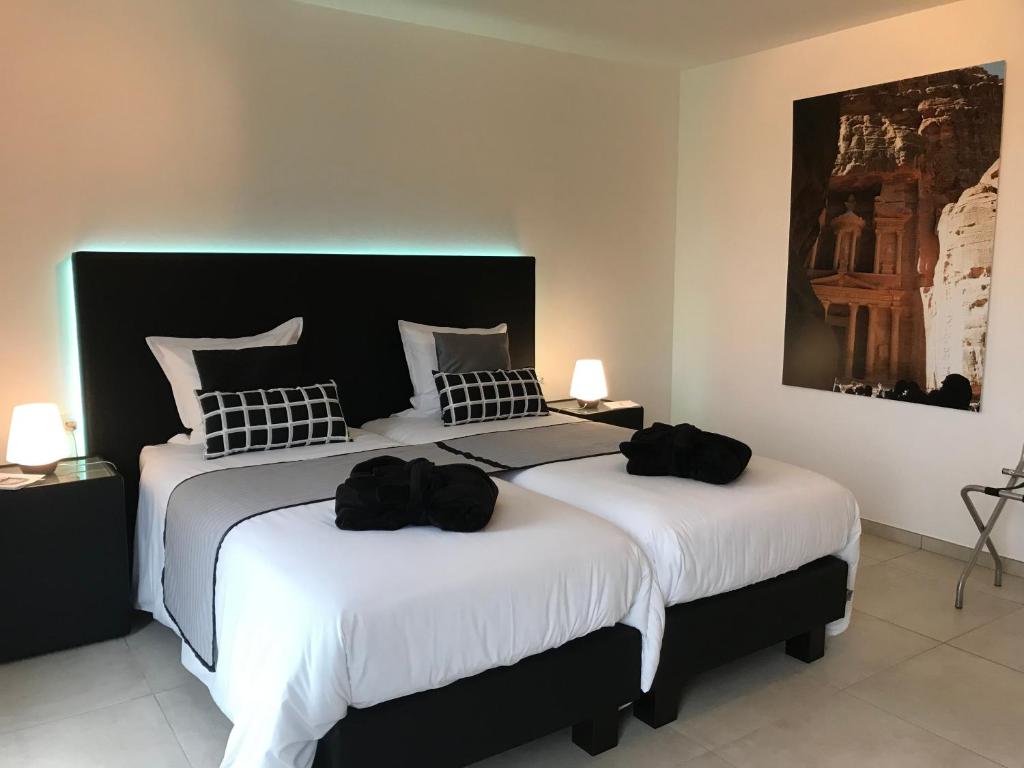 Postel nebo postele na pokoji v ubytování Vita Roka met extra Luxe Privé Wellness