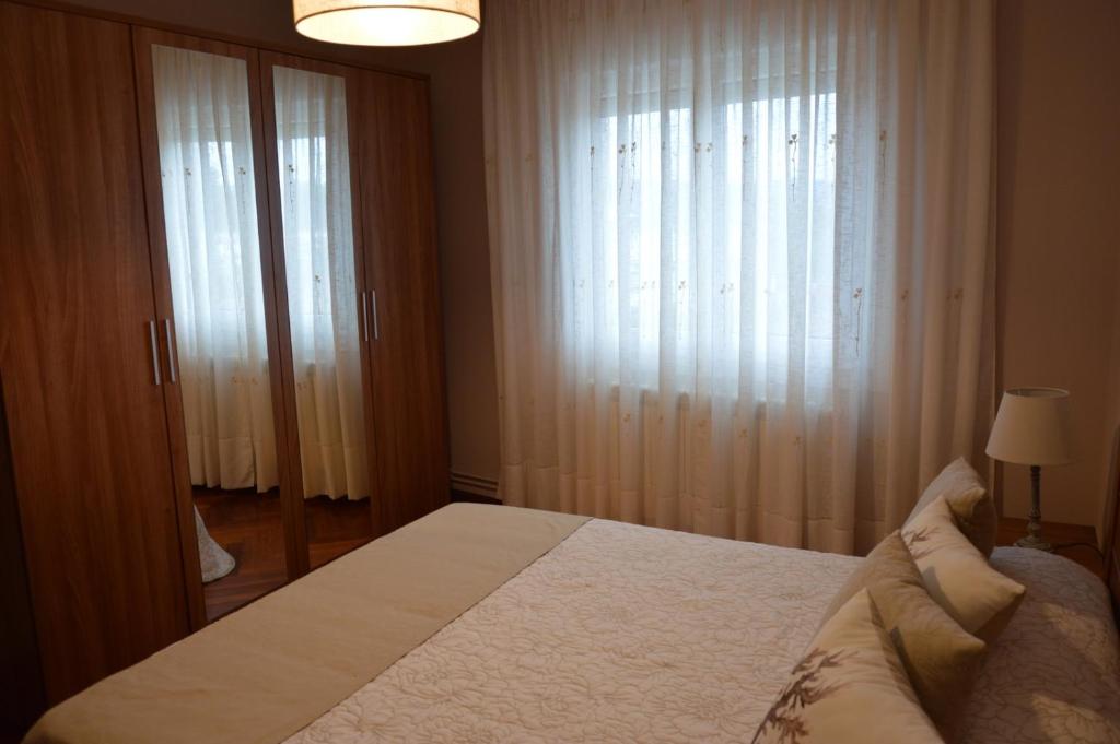 Postel nebo postele na pokoji v ubytování Piso da Empegada