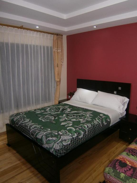 Postel nebo postele na pokoji v ubytování Kucha Wasi Hosteria