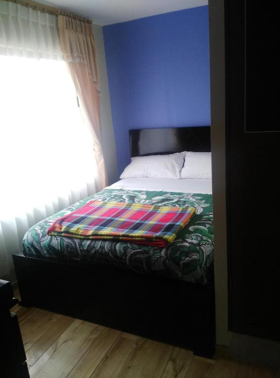 Postel nebo postele na pokoji v ubytování Kucha Wasi Hosteria