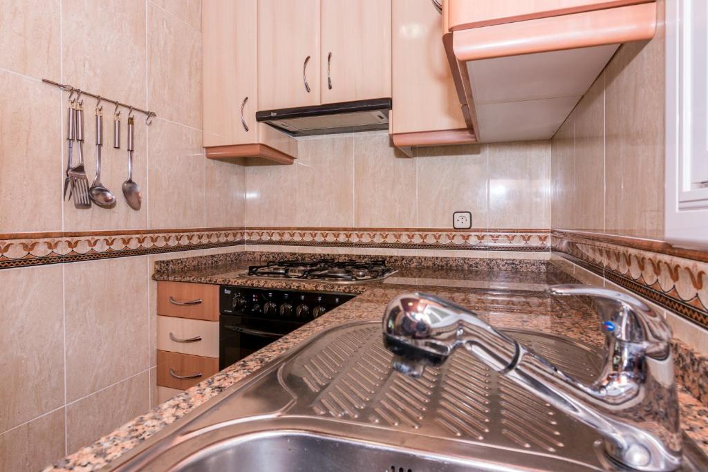 Kuchyňa alebo kuchynka v ubytovaní HomeHolidaysRentals Vall III