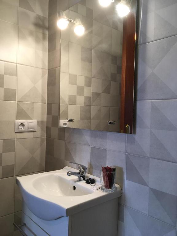 Kúpeľňa v ubytovaní Apartamento Vacacional do Pexigo