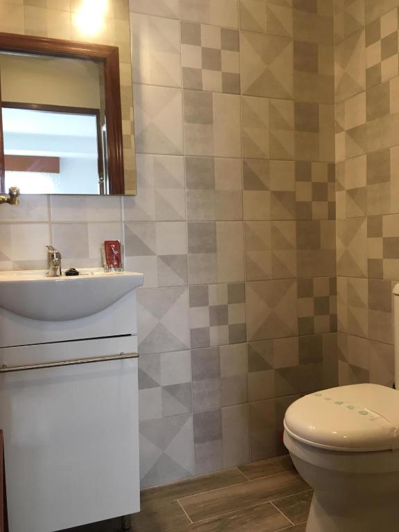 Kúpeľňa v ubytovaní Apartamento Vacacional do Pexigo