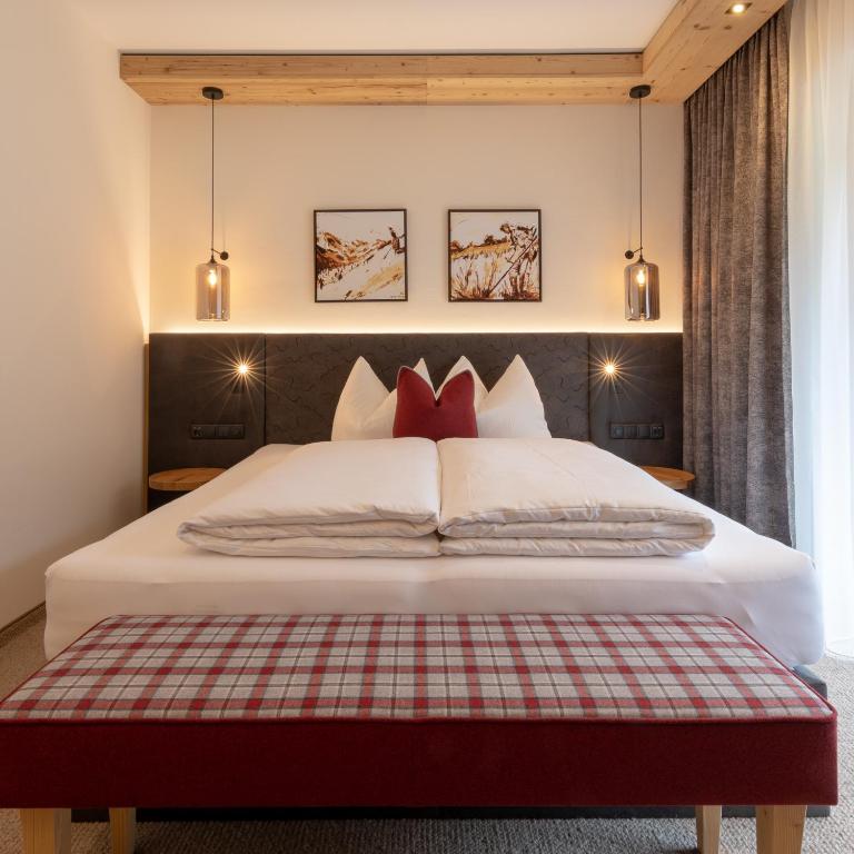 Postel nebo postele na pokoji v ubytování Apartments Edenlehen