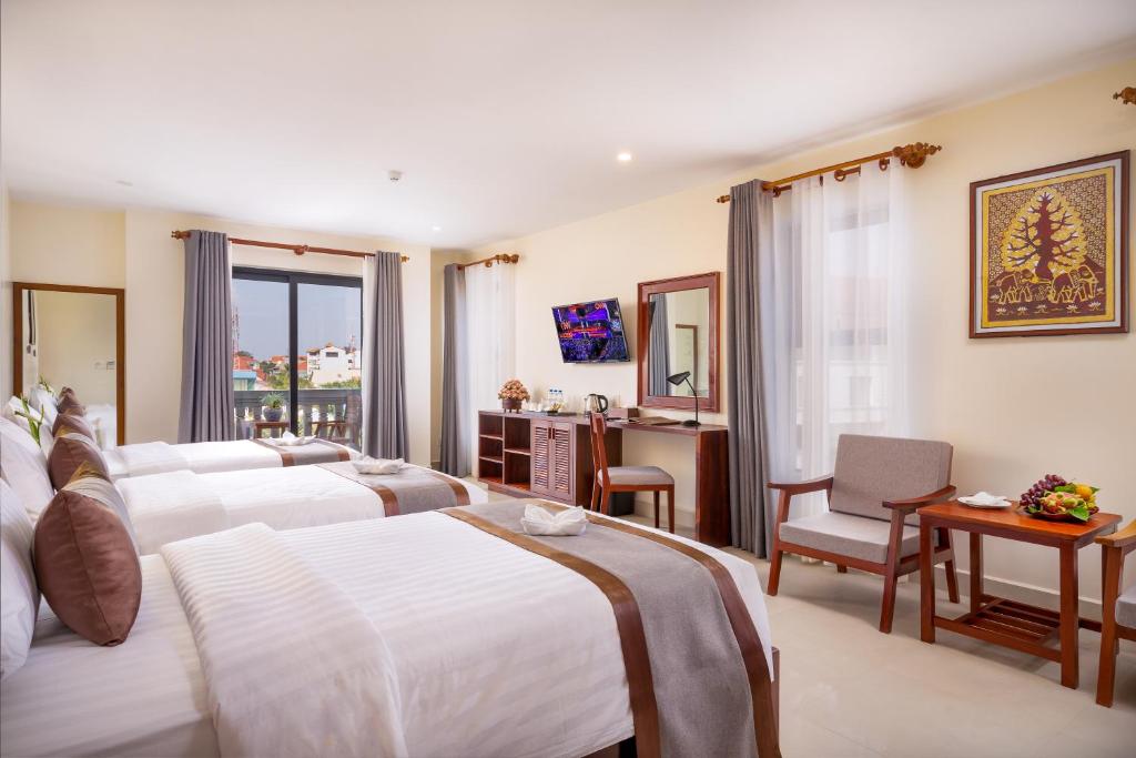 TV a/nebo společenská místnost v ubytování Mony Reach Angkor Hotel