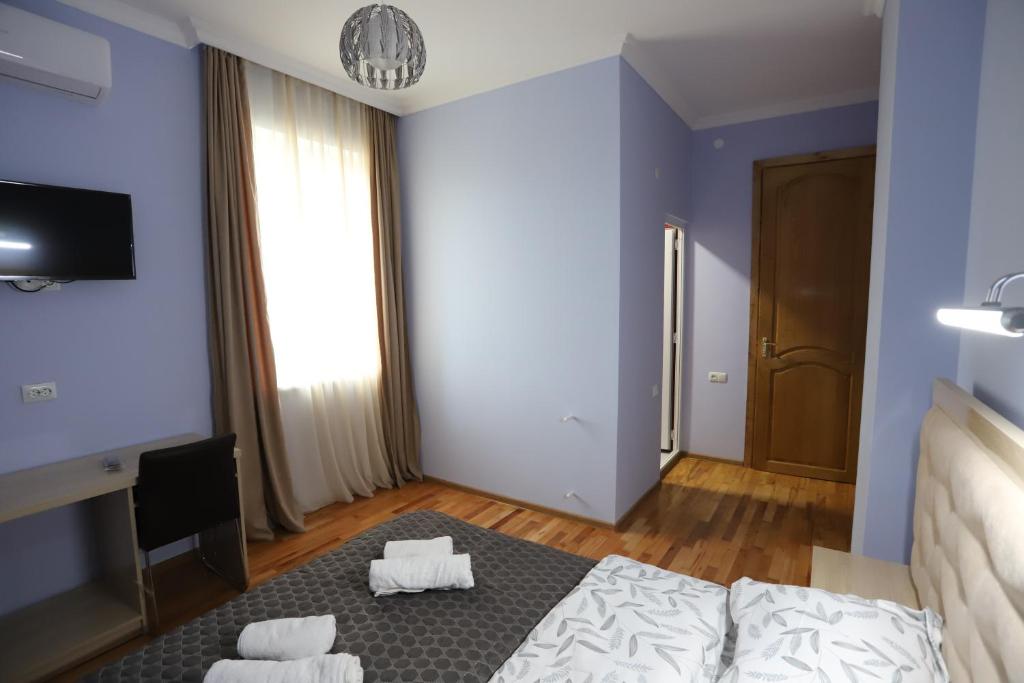 Postel nebo postele na pokoji v ubytování Hotel Hollywood