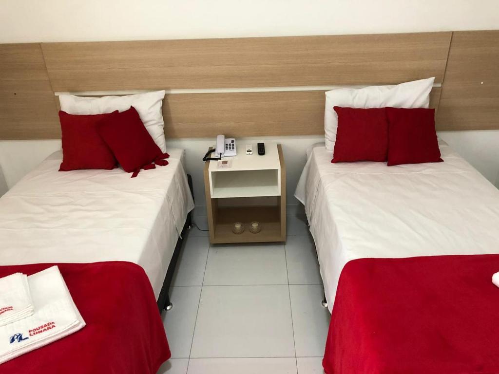 Postel nebo postele na pokoji v ubytování POUSADA LUNARA