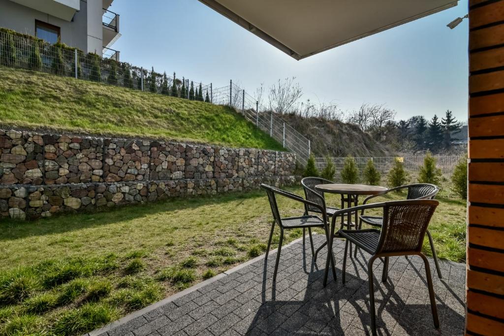 Vonkajšia záhrada v ubytovaní LTC Apartments Malczewskiego Centrum