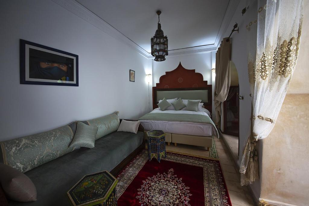 Postel nebo postele na pokoji v ubytování Riad Maison Belbaraka