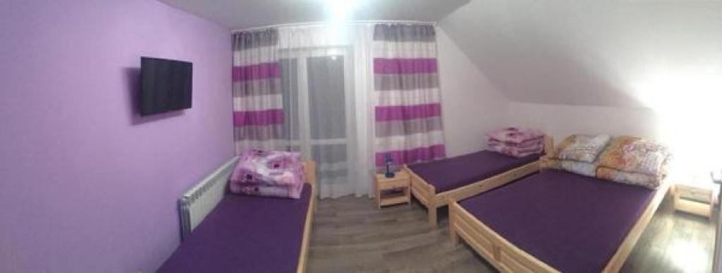 Posteľ alebo postele v izbe v ubytovaní Cichy Potok