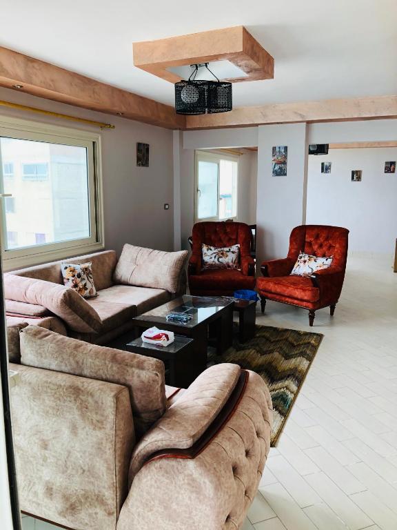 Posezení v ubytování Toscanini Apartament اول صف مباشره