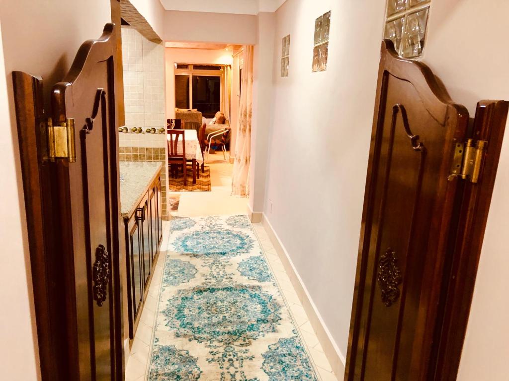 Postel nebo postele na pokoji v ubytování Toscanini Apartament اول صف مباشره